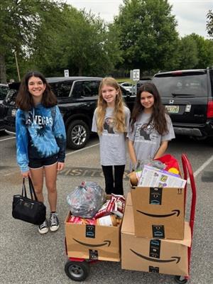 Loading up the donations for Champs Chance Dog Rescue